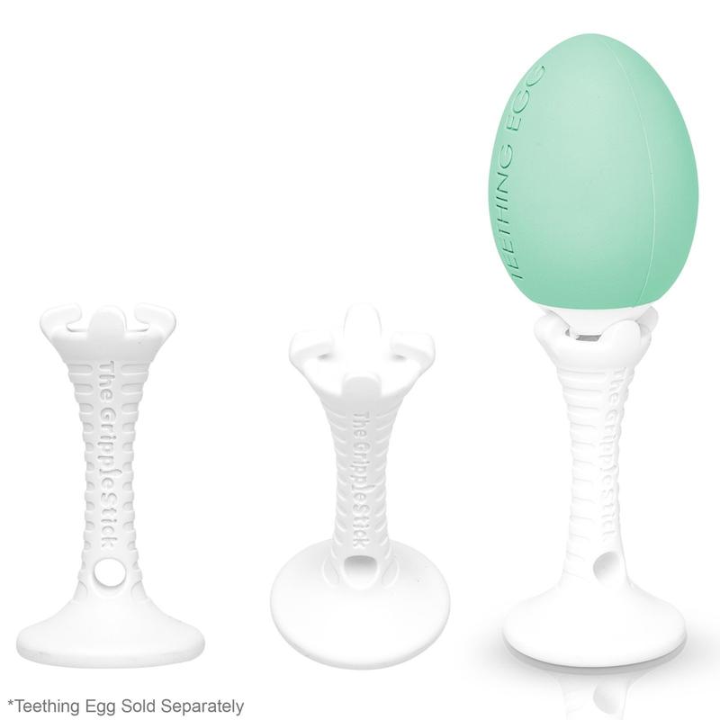 white grippie stick teething handle shown alone and attached to mint green teething egg on white background