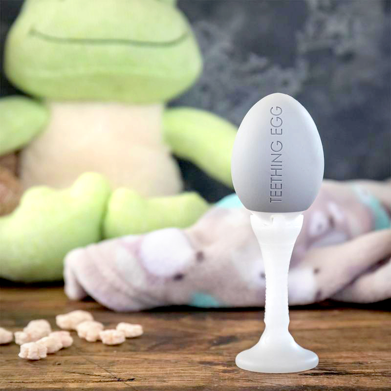 teething egg with grippie stick attached used during playtime