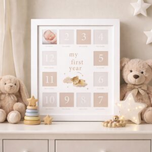 White “My First Year” baby photo frame sitting on a nursery dresser with teddy bears and star decor